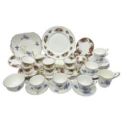 Royal albert Country Rose tea set for six, comprising teacups, saucers, dessert plates, cake plate, covered sucrier and milk jug, together with another tea set  