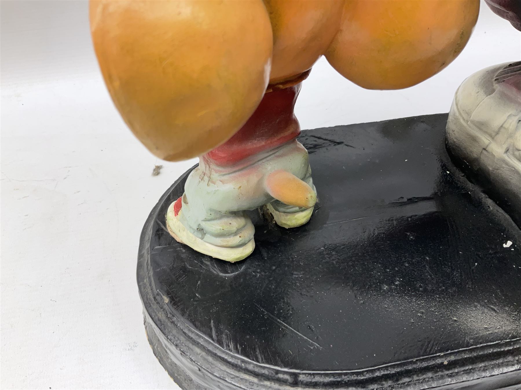 Fibreglass promotional/advertising group of Tom & Jerry, Tom standing wearing a blue track suit with his left hand resting on Jerry's head H63cm