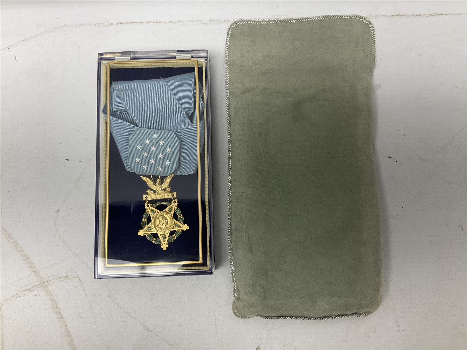 United States of America, Congressional Medal of Honor, gilt metal and enamel, unnamed, reverse of suspension engraved ‘The Congress to’, the neck cravat with pop stud attachments, boxed with felt bag