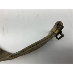 WW2 British black felt beret with Pioneer Corps cap badge, with Kangol Wear maker's mark dated 1943; and a British Army green webbing belt (2)