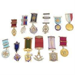 Twelve silver Masonic jewels, including enamelled and silver gilt examples, all stamped or...