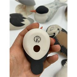 Group of eleven Scottish 'Isle of Arran' bisque porcelain birds, to include Great Northern Diver, Eider, great Crested Greebe, Artic Tern, King Penguin, etc.
