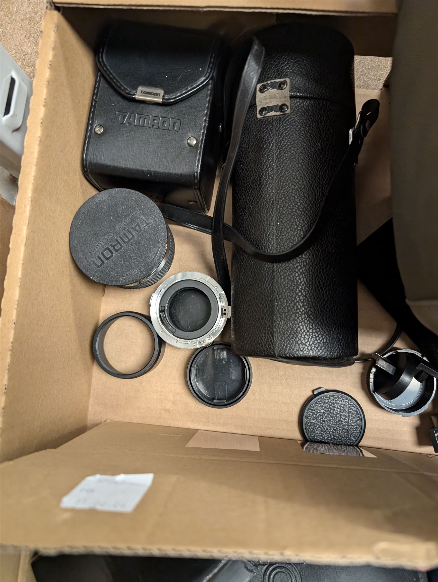 Camera equipment and accessories, including a boxed Manfrotto 290 dual tripods, two other tripods, four Tamron lenses and a collection of filters