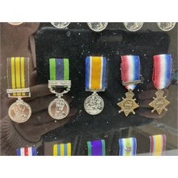 Limited edition large framed display board with sixty half-size copies of British Gallantry and Campaign Medals produced by Danbury Mint; all with ribbons and associated booklet
