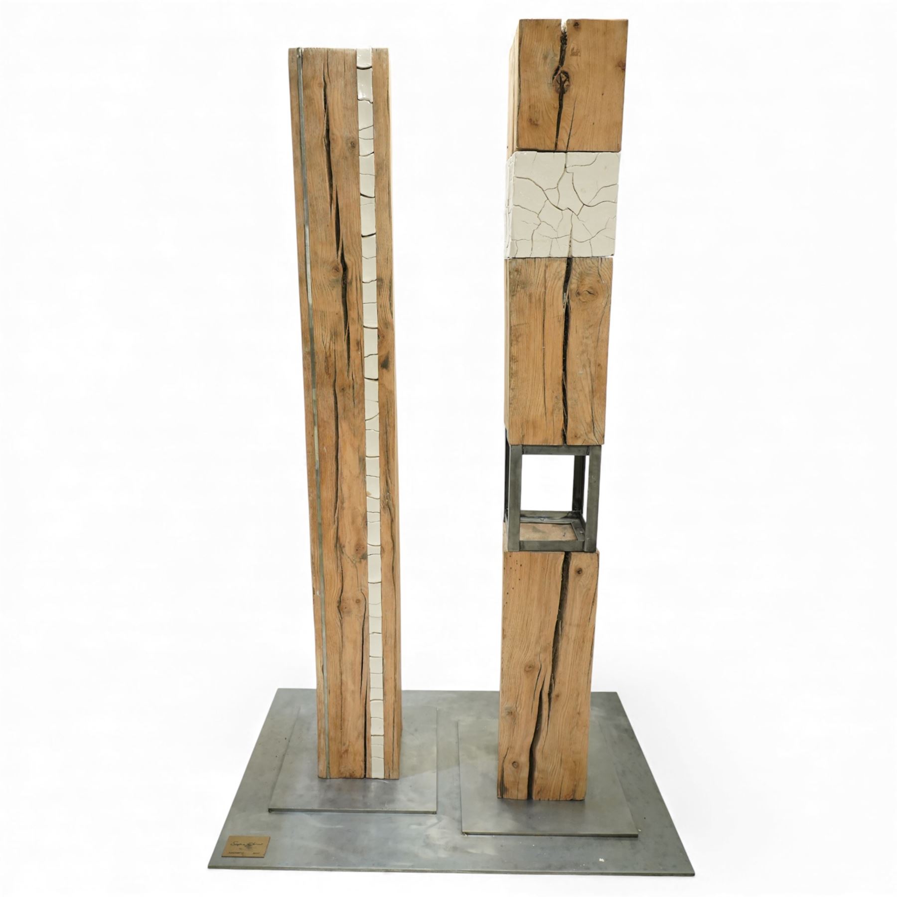 Sophie Olivier (French 1978-): ‘Amour’, 3D sculpture depicting Man & Woman, constructed from driftwood sections with inset ceramic elements and metalwork frames, mounted on a stepped metal base, applied with artist’s plaque and dated 2017