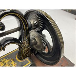 James G Weir 'The Globe' hand-cranked sewing machine, circa 1872, in black finish with gilt and flower painted decoration, the bed stamped Ja's G. Weir, 2 Carlisle Street, Soho Sq., London, with walnut locking carrying case and original manual, boxed H25cm 