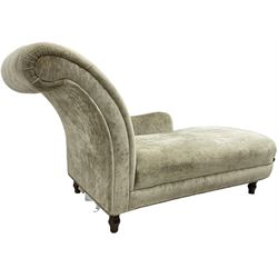Contemporary chaise longue with scrolled back, upholstered in champagne crushed velvet, on turned feet