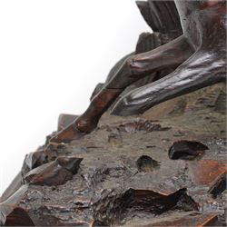 19th-century-8-day German Black Forest mantel clock c1880, with a carved oak case depicting a hunting scene with a stag pursued by hounds amidst rockwork and oak foliage, fitted with a French Parisian movement with a cast brass dial enclosed within a glazed brass bezel with a pendulum adjustment arbor, cartouche blue-on-white enamel  Roman numerals, engraved five minute Arabic's and contrasting steel Fleur-di-Lis hands, twin train going barrel movement with a recoil anchor escapement and countwheel strike. With pendulum.  