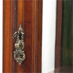 Edwardian inlaid mahogany display cabinet, the moulded cornice above an astragal glazed door enclosing two baize lined shelves, the lower section with a panelled cupboard door, raised on square tapering supports