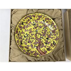 Three Chinese polychrome enamel plates each decorated with floral decoration, all marked beneath, D21cm 