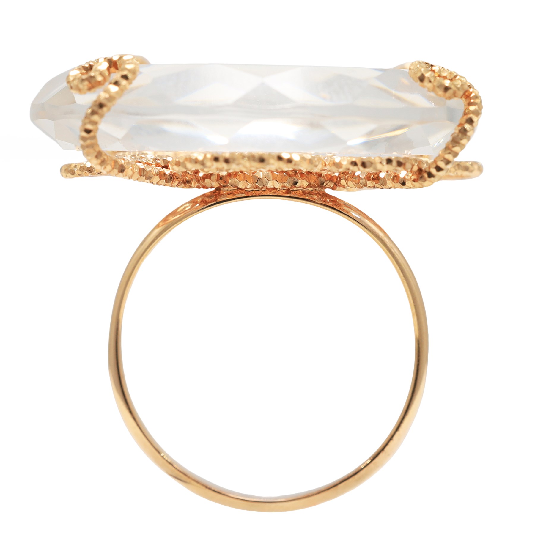 18ct gold rock crystal ring, single round cut crystal, mounted in a fancy textured swirl under setting, stamped 750