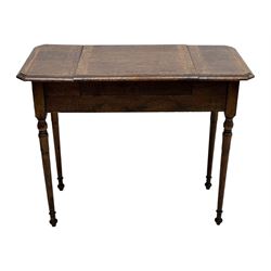 Edwardian oak metamorphic 'Britisher Writing Table', rectangular hinged top revealing correspondence compartments and hinged writing surface with underside storage, flanked by twin hinged compartments with dividers, on turned supports