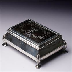Edwardian silver rectangular trinket box with padded interior, the hinged cover inset with...