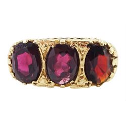 9ct gold ring, set with three oval cut garnets, London 1971