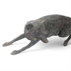 Spelter figure of a crouching fox, H24cm, L70cm 