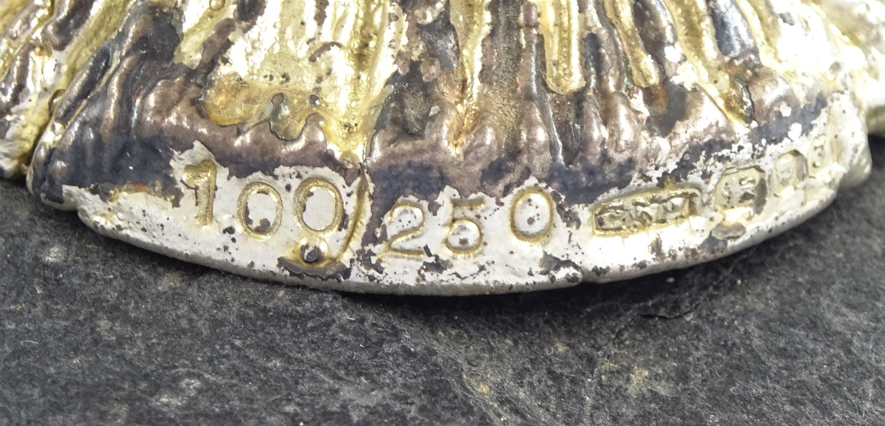 Christopher Nigel Lawrence limited edition silver and parcel gilt surprise mushroom, the textured domed cover opening to reveal two elves decorating a semi-precious gem set Christmas tree, upon a slate base, no 100/250, hallmarked Christopher Nigel Lawrence, London 1980, overall H9cm