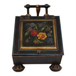 Late Victorian hand painted toleware coal scuttle, black painted tin body hand painted with floral sprays, fitted with shaped shovel to reverse and gilt painted circular feet H44cm