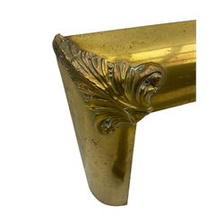 Early 20th century brass fire fender. with foliate decorated rails (W138cm, D46cm), another early 20th century cushioned fire curb (W138cm, D39cm), and a selection of fireside tools