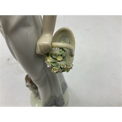 Three Lladro figures, comprising Garden Classic, signed no 7617, Summer Stroll no 7611 and Best Friend no 7620, all with original boxes, largest example H24cm 