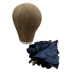 Linen hat/wig stand and a Victorian parasol with turned wood and bone handle