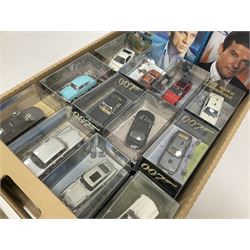 Fabbri James Bond Collection - over one hundred and ten die-cast models in perspex display cases as issued periodically; and a quantity of associated magazines and trading cards, in five boxes