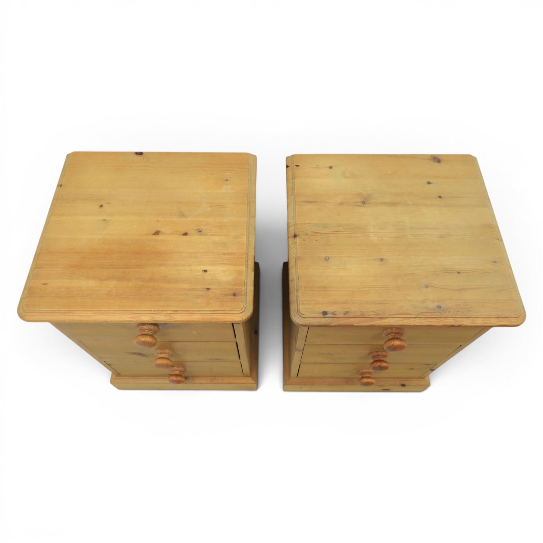 Pair of solid pine three drawer bedside pedestal chests