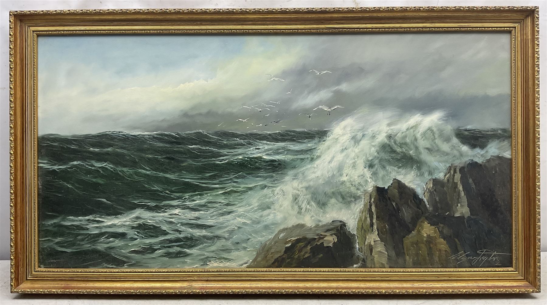 Edgar Freyberg (German 1927-2017): 'Surf' Waves Breaking on a Crag, oil on canvas signed, titled on label verso 50cm x 100cm