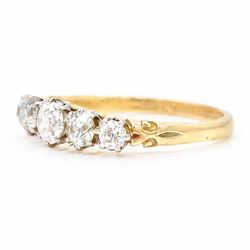 Gold diamond ring, set with five graduating old cut diamonds, stamped 18ct, total diamond weight approx 0.90 carat