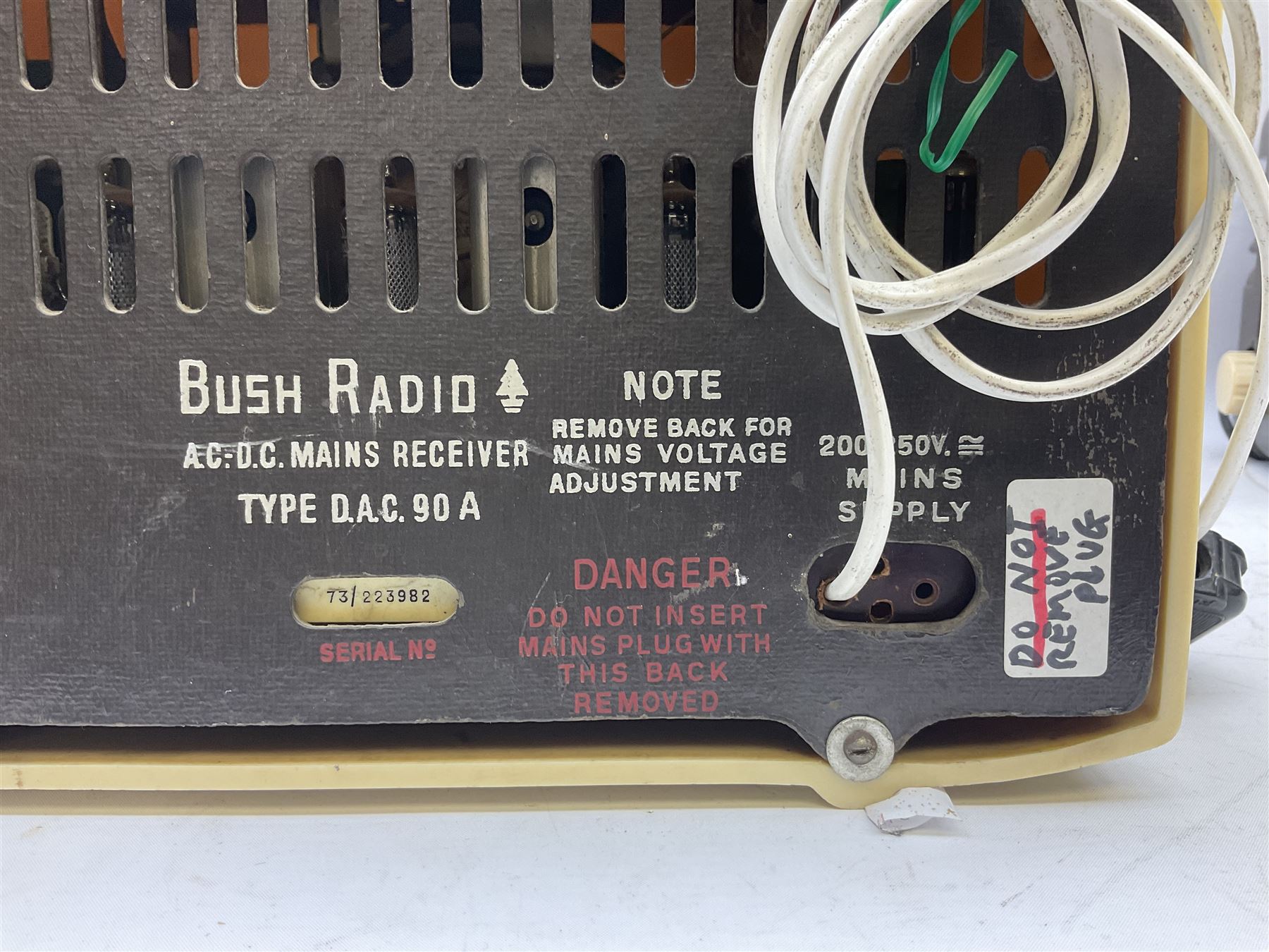 1950s Bush Type DAC 90A valve radio in cream Bakelite case, H23cm W29cm D19cm, together with Bush Type DAC 10 radio in brown Bakelite case