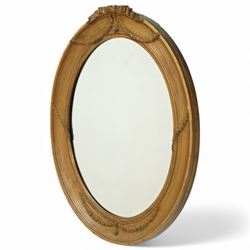 Edwardian neoclassical style oval giltwood mirror, ribbed frame, decorated with floral wreaths and ribbons 68x57cm