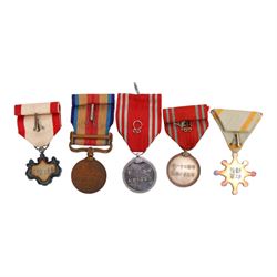 Five Japanese medals, including Order of the Sacred treasure, Order of Rising Sun, two Red Cross medals and Incident war medal  
