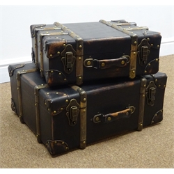  Graduating set of two leather and wooden bound trunks, W50cm  