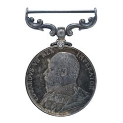 Royal Navy Long Service and Good Conduct Medal awarded to 'Pte H.C Oakman Suffolk Regt', together with a Yorkshire Regiment cap badge