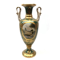  20th century Ludwigsburg two-handled vase painted with figures in a country landscape on green and gilt ground, swan moulded handles and circular foot, H50cm   