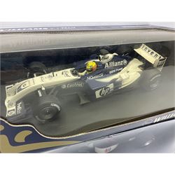 Four Minichamps 1:18 scale die-cast racing cars - Williams F1 Team BMW FW26 R. Schumacher; McLaren Mercedes MP4-12 D. Coulthard; McLaren Mercedes MP4-13 M. Hakkinen; and Formel 1 Jordan peugeot EJR 195 E. Irvine; all boxed (4)