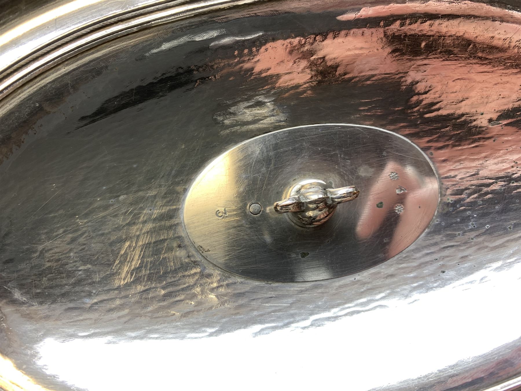 Matthew Boulton silver plated tureen and cover, the body of oval form with twin handles engraved with crest, probably for Whitgreave/Whitgrave family of Moseley Staffordshire, 'Regem Defendere Victum', (To defend the king even in his defeat/To defend the conquered king ), upon four paw feet, the cover with gadrooned rim and foliate loop handle 