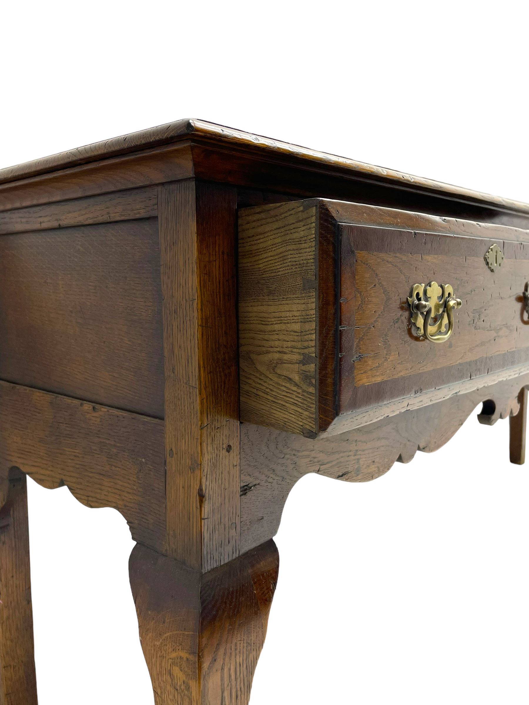 Georgian design oak dresser base, moulded rectangular top over three drawers with moulded fronts and mahogany bandings, shaped apron on cabriole front supports