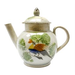 Late 18th/early 19th century miniature teapot, the body painted with an exotic bird amongst foliage, the body and cover heightened with silver lustre, H9.5cm

Cf. Robin Emmerson, British Teapots & Tea Drinking, p. 117, fig. 135 for a comparable example. Emmerson notes that a teapot of this size may have been produced as a toy, or alternatively for customers who could not afford to drink tea in large quantities
