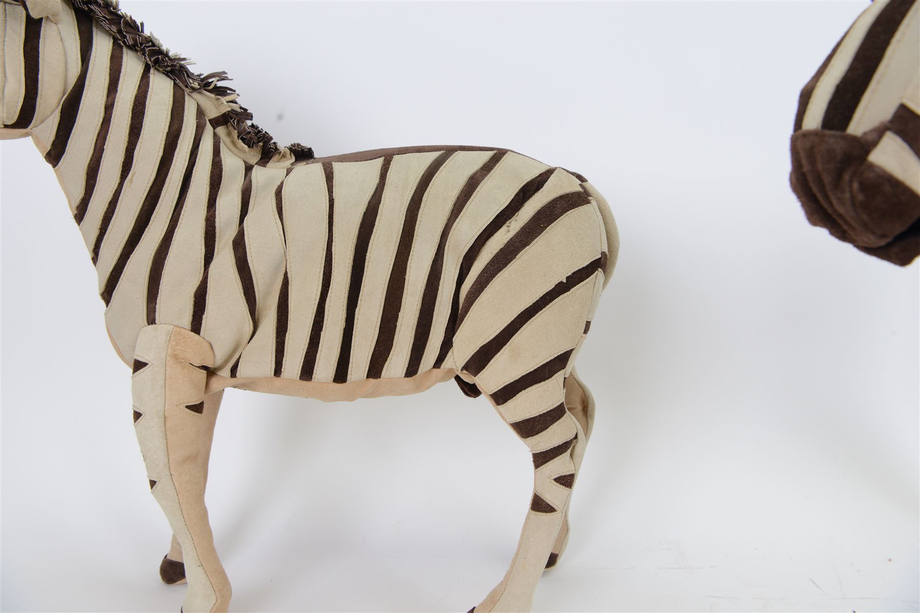 Karen Trower: two zebra sculptures, with leather sew over wood and metal frames, H48cm