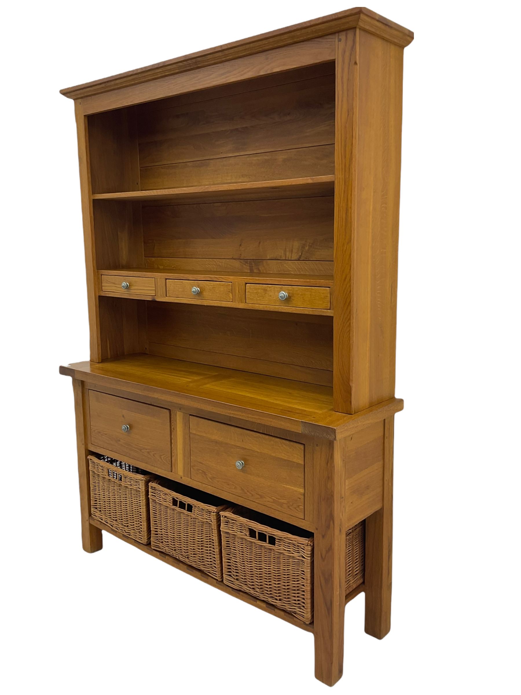 Manor Oak - light oak dresser and rack, fitted with two shelves with three drawers, two deep drawers and pot baked base with basket storage