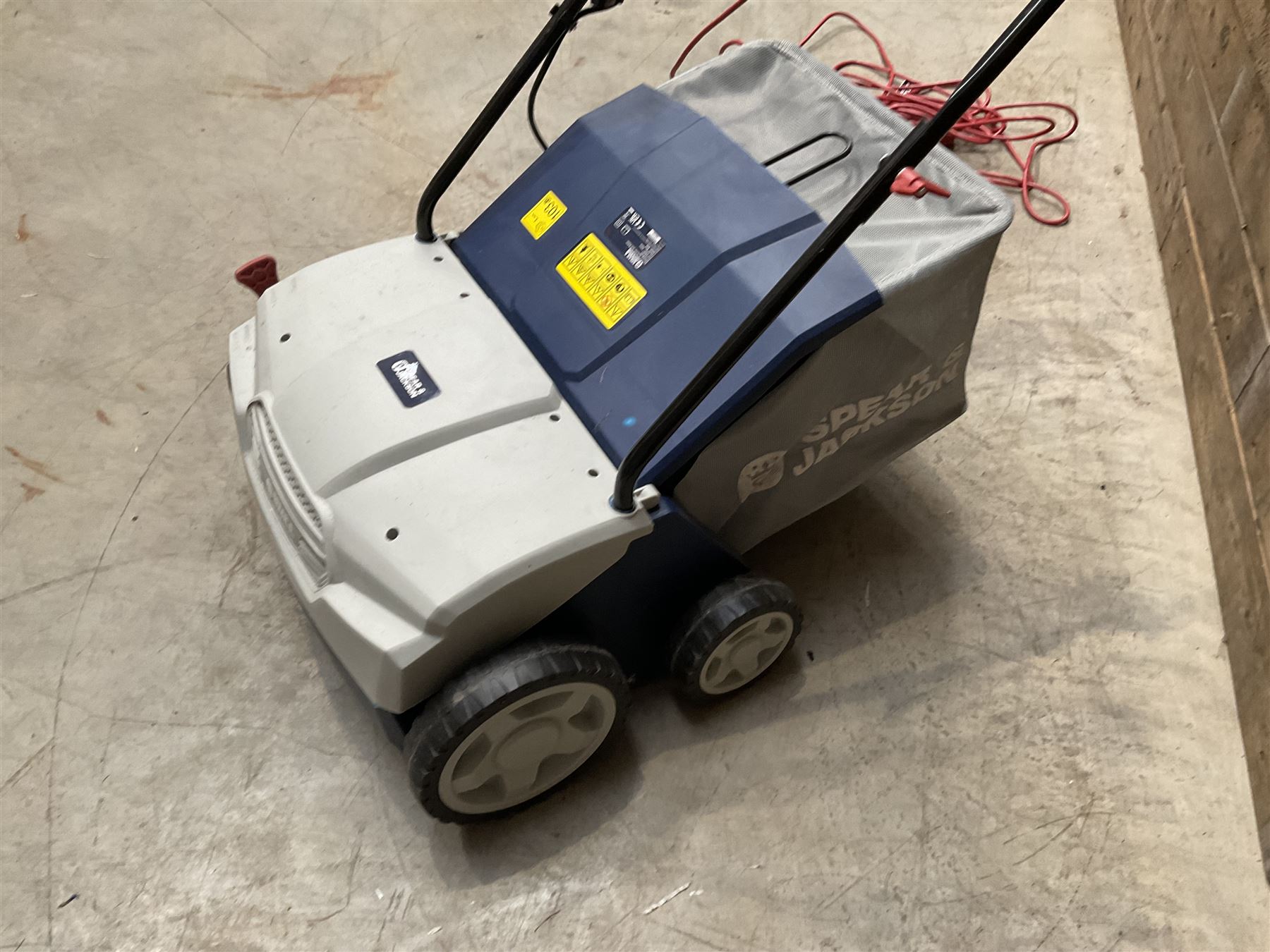 Petron PWR21CCGTA strimmer and a Spear & Jackson 1400W 2in1 Scarifier & Raker