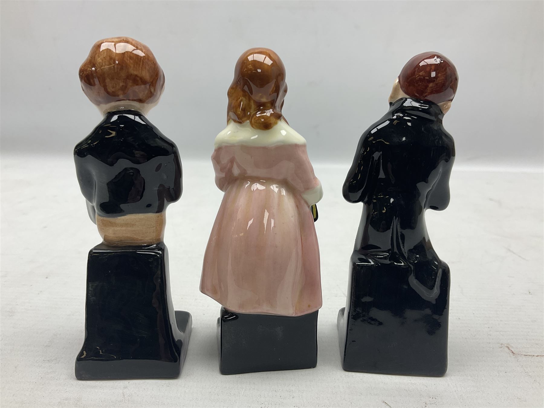 Sixteen Royal Doulton Charles Dickens figures, to include Oliver Twist, Fat Boy, Fagan, Stiggins etc, all with printed marks beneath