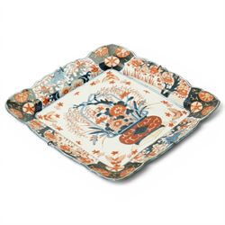 Late 19th/early 20th century Japanese Imari square dish decorated with flowers 32cm and an Indian linen wall hanging decorated with elephants, carriages etc in procession 56cm x 170cm