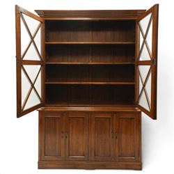 OKA - Glazed bookcase dark oark cabinet, the top with projecting cornice above astragal style glazed doors metal turned knobs, enclosing adjustable full length shelving, the lower half with two sets of twin cabinet doors housing fixed shelving, raised on a moulded plinth base  