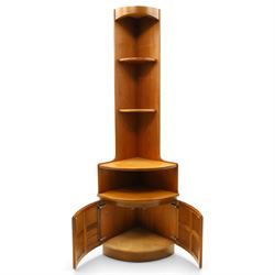 Nathan - 'Squares' open corner bookcases, with two adjustable shelves above an open recess with twin square panelled doors, raised on a plinth base