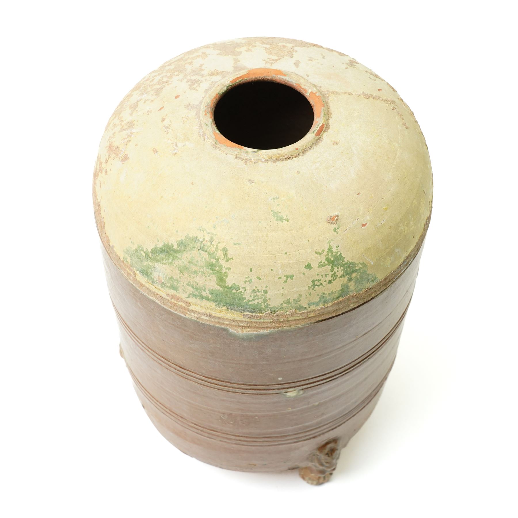 Chinese Han dynasty (202BC-9AD) brown glazed grain store, of cylindrical form, the feet formed as lions,  H26cm