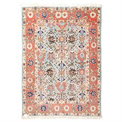 Persian Tabriz cyan ground rug of Benlian design, the field decorated with large palmette ...