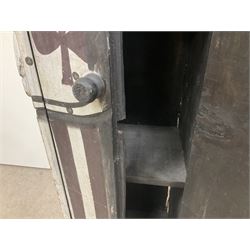 Folk art circus clown cabinet, the the two hinged doors with bow tie decoration opening to reveal fitted shelved interior, the body painted with polka dots and spades, H121cm