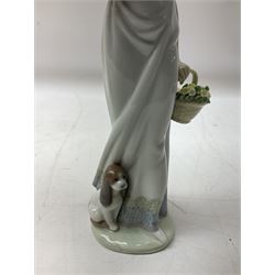 Two Lladro figures, comprising Garden Classic, no 7617 and Garden Song, no 7618, with original boxes and artists signature beneath, largest example H23cm