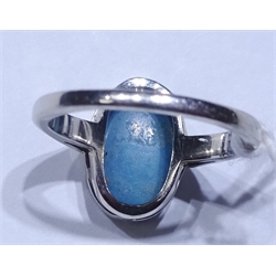  Opal rim set white gold ring, stamped 10k  